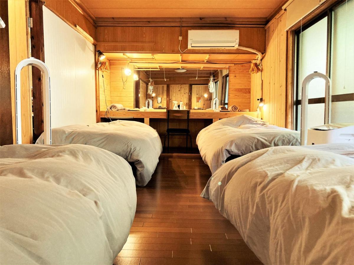 奄美ゲストハウス Hub A Nice Inn Setouchi  Ngoại thất bức ảnh