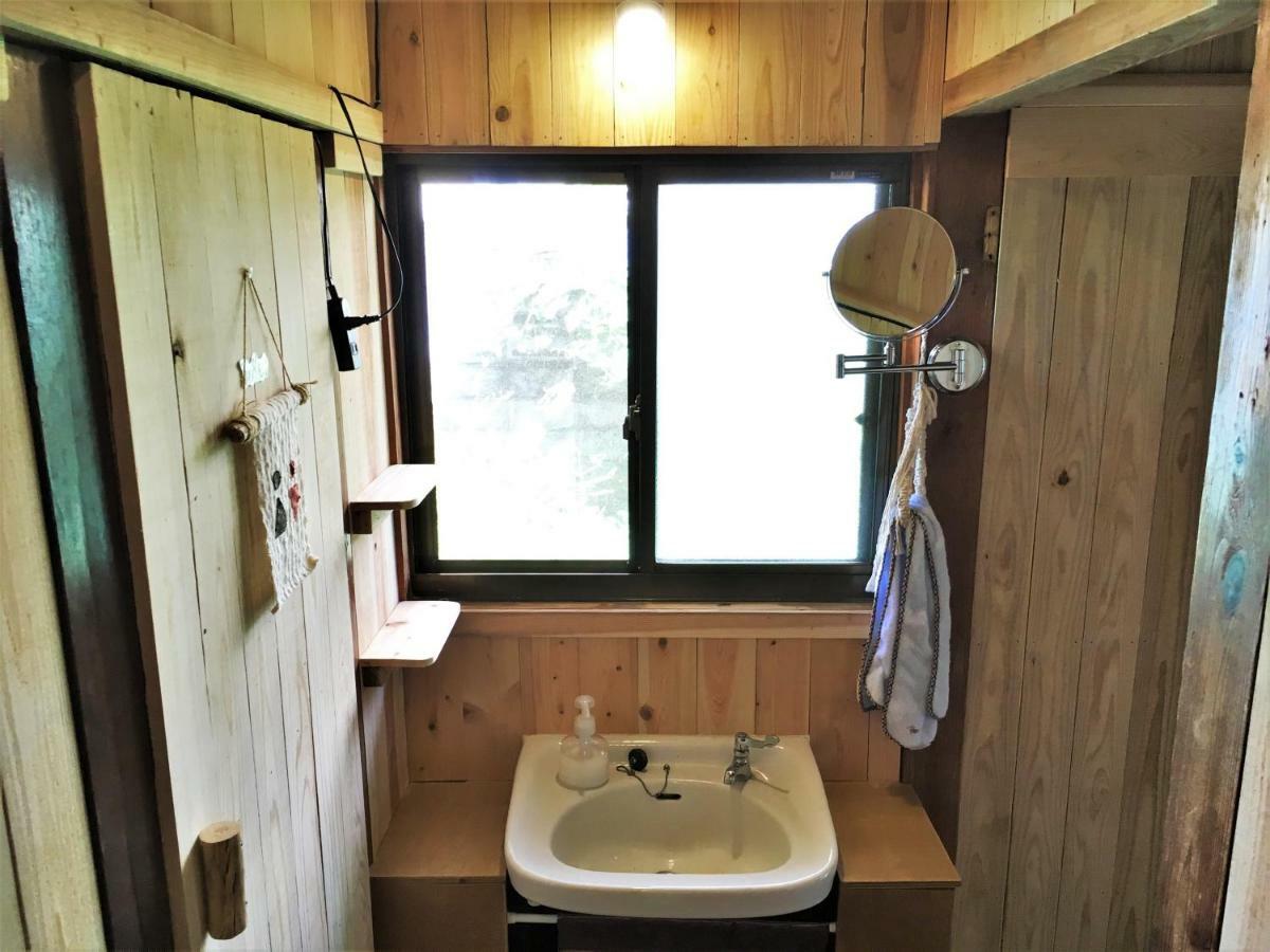 奄美ゲストハウス Hub A Nice Inn Setouchi  Ngoại thất bức ảnh